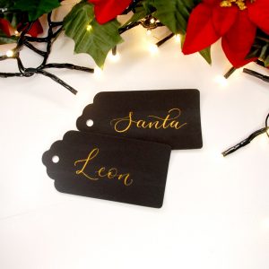 Black gift tag with gold name