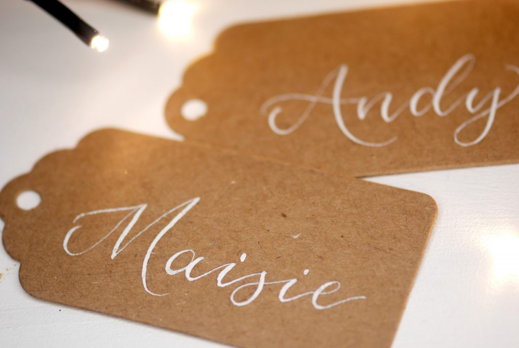 Personalised kraft card gift tags with name in white ink in calligraphy