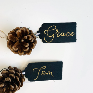 Black gift tag with hand lettered name