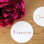White circular table settings for events
