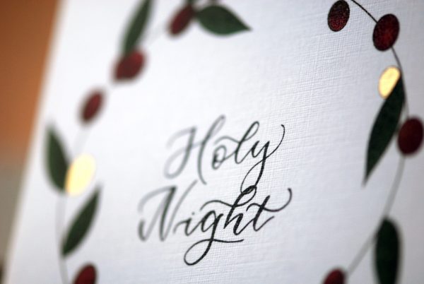 Luxury christmas card with leaf wreath design and gold accents with Holy night phrase