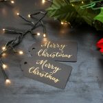 Black gift tags with Merry Christmas
